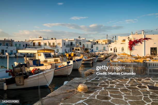 sunrise at naoussa harbor, paros, cyclades, greece - paros greece stock pictures, royalty-free photos & images