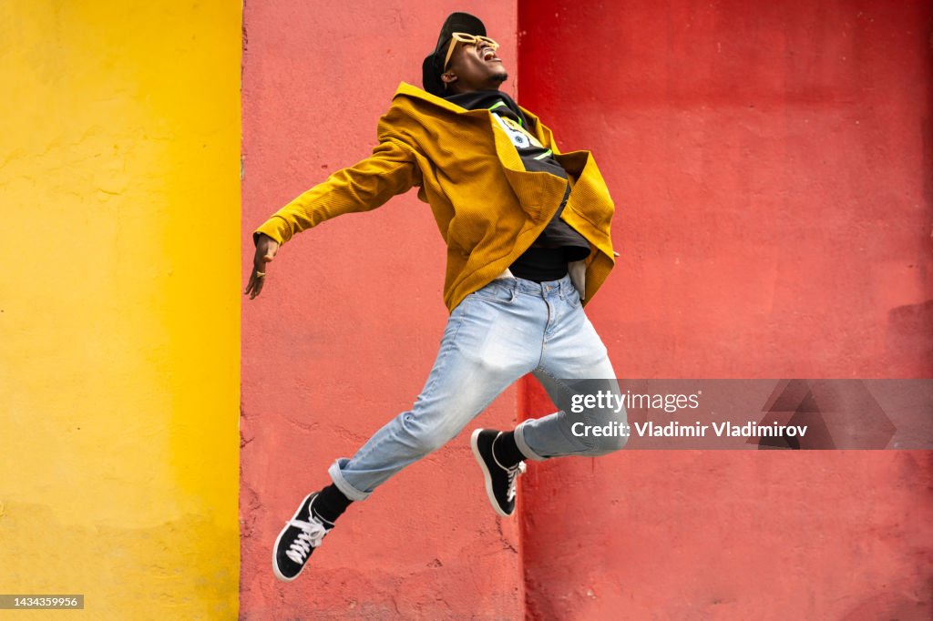 Male urban dancer in the air
