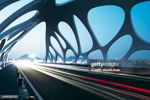 modern bridge structure - qingdao stock-fotos und bilder