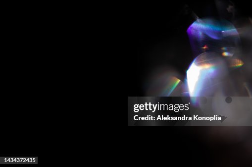 Colourful rainbow light leaks texture on black background Colourful rainbow light leaks texture on black background