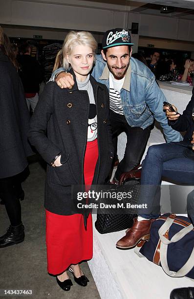 Pixie Geldof and Guy Lowndes attend the launch of M&S Shwopping at the Shwop Lab on April 26, 2012 in London, England.