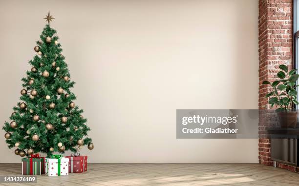 vide salon rétro nostalgique non meublé avec un mur de plâtre blanc et un mur de briques en partie ruiné et une décoration de noël - sapin de noël photos et images de collection