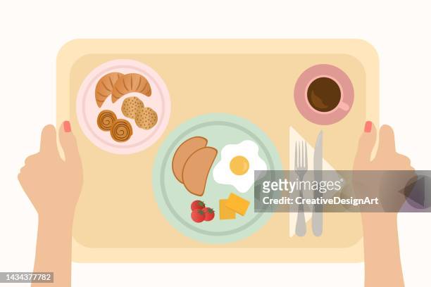 high angle view of woman hand holding breakfast tray - breakfast with view stock illustrations