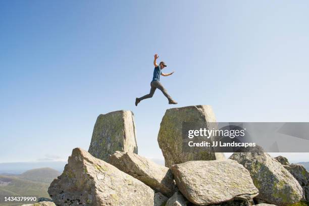 Leap Over Rocks 8,803 Leap Across Rocks Stock Photos, High-Res Pictures, and Images ...