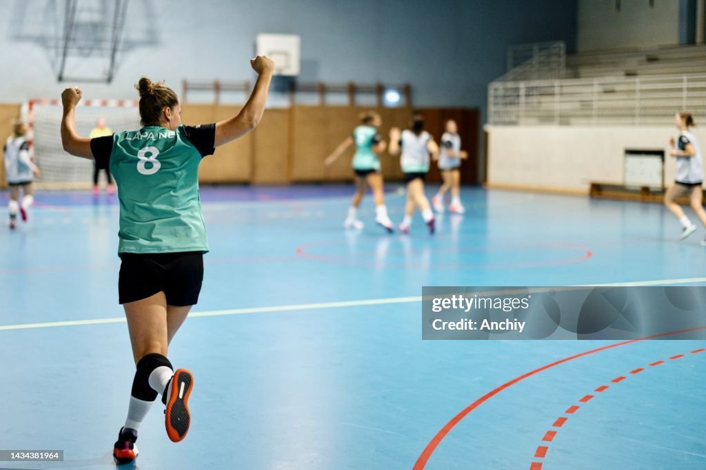 Handball player celebrating goal