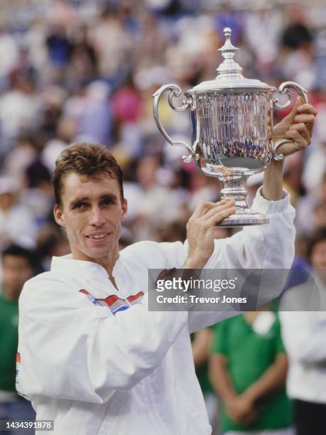 Ivan Lendl of Czechoslovakia holds the Men's Singles Champion trophy after defeating compatriot Miloslav Mecír during their Men's Singles Final match...