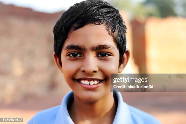 cheerful child portrait close up - indian boy portrait stockfoto's en -beelden