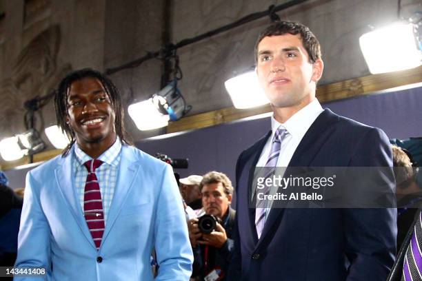 Quarterback prospects Robert Griffin III from Baylor and Andrew Luck from Stanford arrive on the red carpet during the 2012 NFL Draft at Radio City...