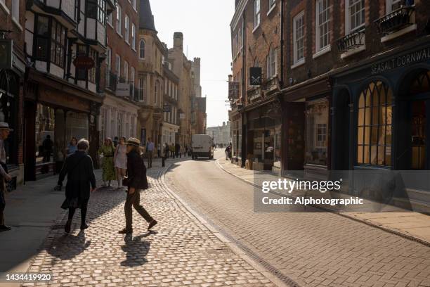 trinity street, cambridge - window awnings stock-fotos und bilder