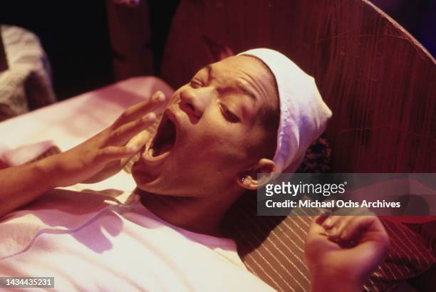 Will Smith a.k.a. The Fresh Prince yawning in a scene from the video for 'A Nightmare On My Street', 1988. The song was a collaboration with DJ Jazzy...