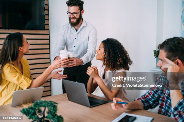 business persons on meeting in the office. - passing giving stockfoto's en -beelden