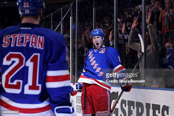 Marc Staal celebrates with Derek Stepan of the New York Rangers after Stepan assisted Staal on his second period goal against the Ottawa Senators in...