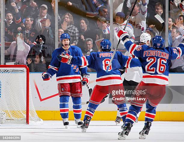 Dan Girardi of the New York Rangers celebrates his second period goal against the Ottawa Senators in Game Seven of the Eastern Conference...