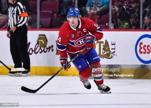 Nick Suzuki of the Montreal Canadiens skates against the Pittsburgh Penguins during the second period at Centre Bell on October 17, 2022 in Montreal,...