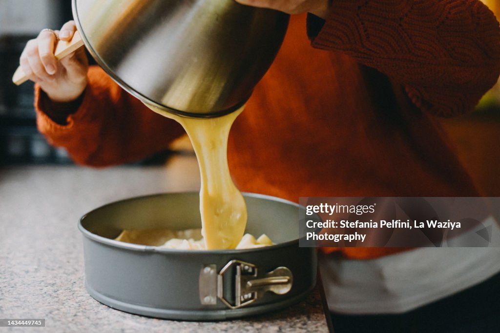 Pouring Cake Batter in Cake Pan