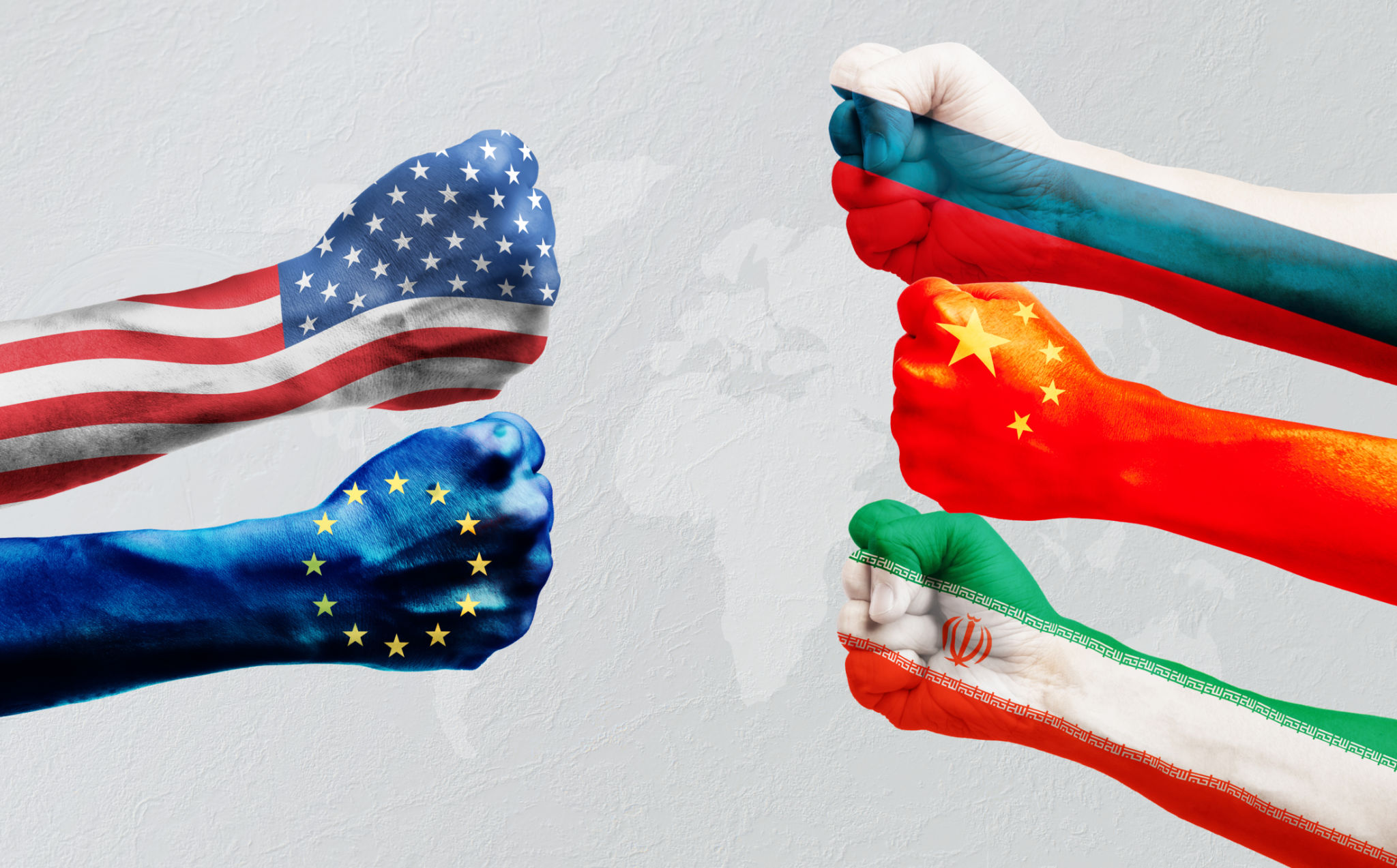 Flags of US or United States of America, Russia, Iran, EU or European Union and China on hands punch to each others on world map Flags of US or United States of America, Russia, Iran, EU or European Union and China on hands punch to each others on world map