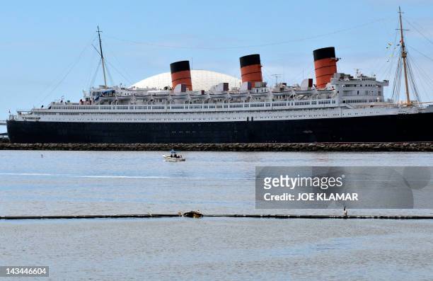 The famous retired ocean liner Queen Mary rests on Long Beach harbour, California, on April 26, 2012. The history of Queen Mary dates back to 1936...