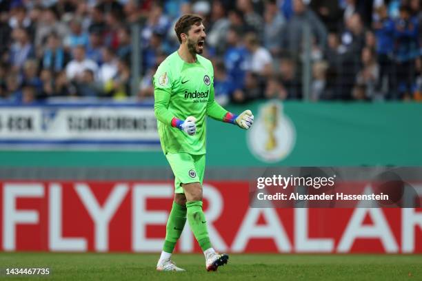 Kevin Trapp of Eintracht Frankfurt celebrates after teammate Randal Kolo Muani scores their team's first goal during the DFB Cup second round match...