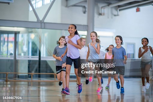 Run In Class Children Running In Physed Class High-Res Stock Photo - Getty Images