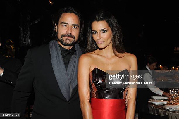 Dinho Diniz and Fernanda Motta attend amfAR's 2nd Annual Inspiration Gala Sao Paulo at the home of Dinho Diniz on April 26, 2012 in Sao Paulo, Brazil.