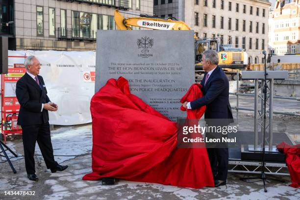 Justice Secretary Brandon Lewis unveils one of flagstones to mark the site of the new Salisbury Square development on October 18, 2022 in London,...