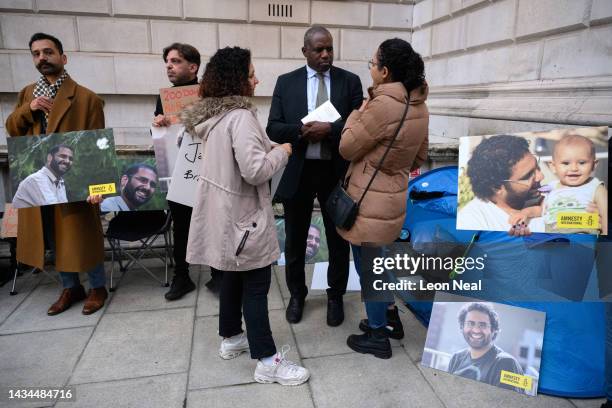 Shadow Home Secretary David Lammy stands with Mona and Sanaa Seif , as they hold a protest calling for the release of their brother Alaa Abd...