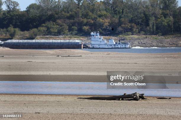 Barges are pushed up the Mississippi River on October 18, 2022 near Portageville, Missouri. Lack of rain in the Ohio River Valley and along the Upper...