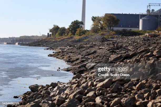 Rocks are exposed by retreating water along the banks of the Mississippi River on October 18, 2022 near Marston, Missouri. Lack of rain in the Ohio...