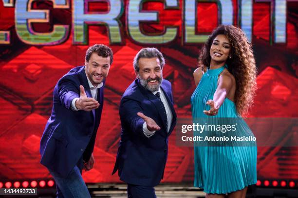 Andrea Cerelli, Flavio Insinna and Samira Lui pose for a session for the "L'Eredità" Rai Tv Show at Rai Studios on October 18, 2022 in Rome, Italy.