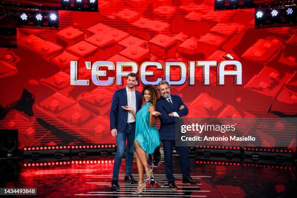 Andrea Cerelli, Flavio Insinna and Samira Lui pose for a session for the "L'Eredità" Rai Tv Show at Rai Studios on October 18, 2022 in Rome, Italy.