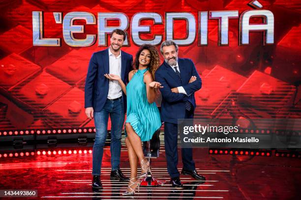 Andrea Cerelli, Flavio Insinna and Samira Lui pose for a session for the "L'Eredità" Rai Tv Show at Rai Studios on October 18, 2022 in Rome, Italy.