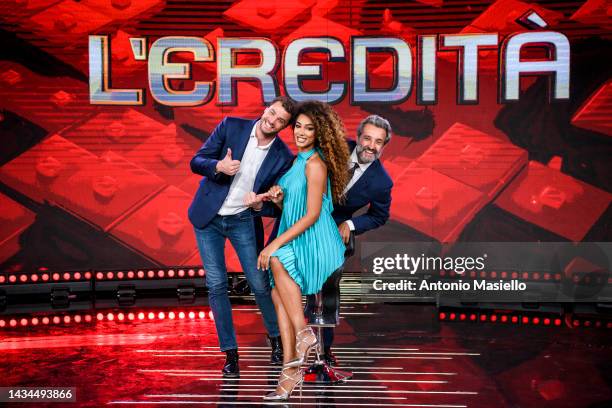 Andrea Cerelli, Flavio Insinna and Samira Lui pose for a session for the "L'Eredità" Rai Tv Show at Rai Studios on October 18, 2022 in Rome, Italy.