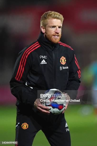 Coach Paul McShane of Manchester United U21s warms up ahead of the Papa John's Trophy match between Fleetwood and Manchester United U21s at Highbury...