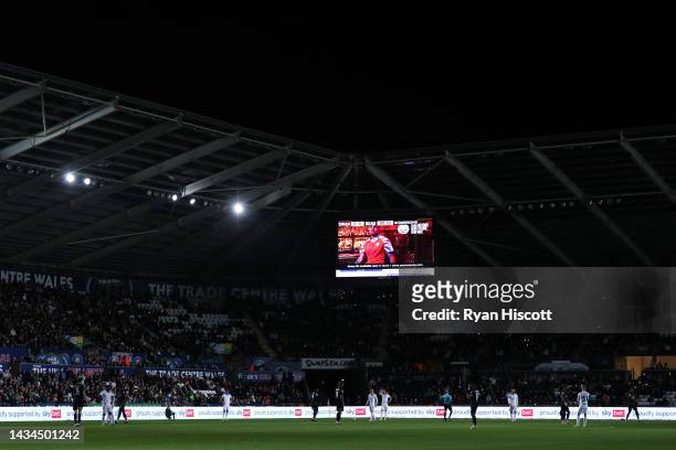 General view as fans and players wait for play to resume after power issues effect the stadium lighting during the Sky Bet Championship between...