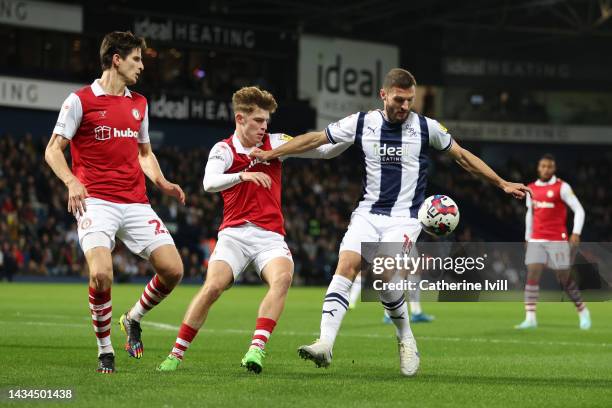 Timm Klose and Alex Scott of Bristol City battles for possession with Erik Pieters of West Bromwich Albionduring the Sky Bet Championship between...