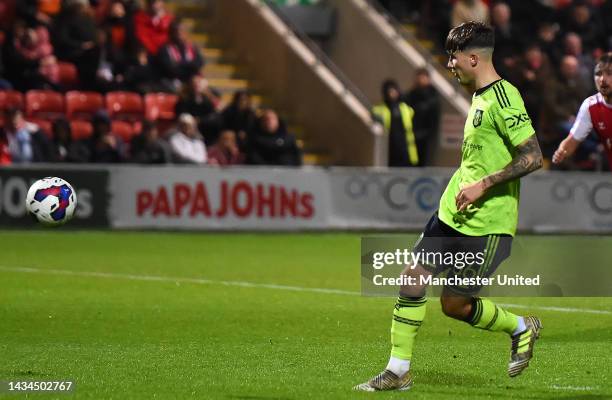 Charlie McNeill of Manchester United U21s scores their first goal during the Papa John's Trophy match between Fleetwood and Manchester United U21s at...