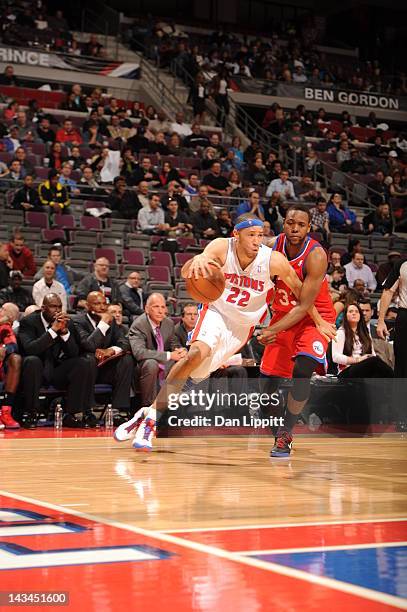 Tayshaun Prince of the Detroit Pistons drives against Craig Brackins of the Philadelphia 76ers during the game between the Detroit Pistons and the...