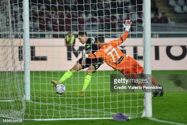 Pietro Pellegri of Torino FC scores their team's second goal past Luca Maniero of Cittadella during the Coppa Italia match between Torino FC and...