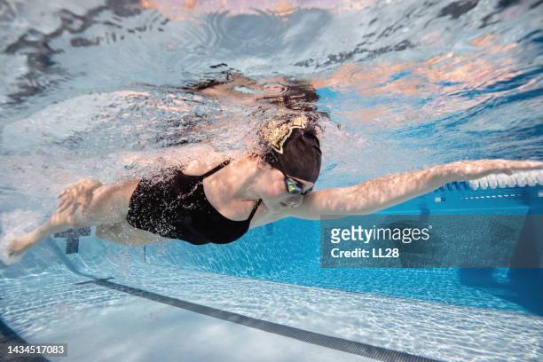 healthy lifestyle - freestyle swimming stock pictures, royalty-free photos & images