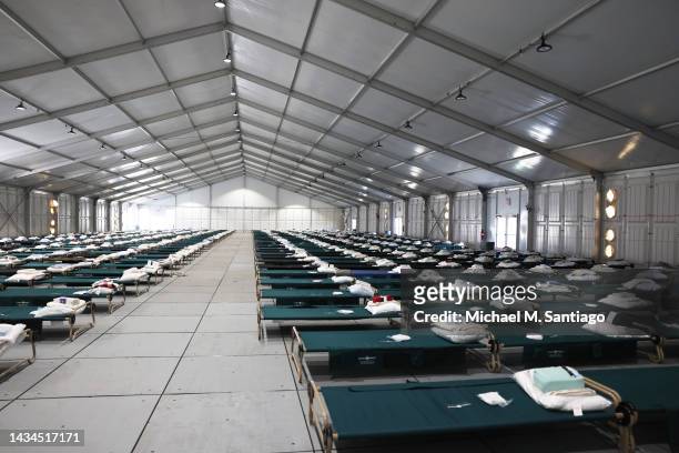 Beds are seen in the dormitory during a tour of the Randall's Island Humanitarian Emergency Response and Relief Center on October 18, 2022 in New...
