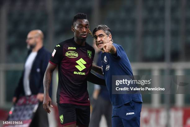 Yann Karamoh speaks to Ivan Juric, Head Coach of Torino FC during the Coppa Italia match between Torino FC and Cittadella at Olimpico Stadium on...