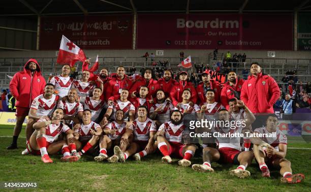 Players of Tonga pose for a team picture following the Rugby League World Cup 2021 Pool D match between Tonga and Papua New Guinea at Totally Wicked...