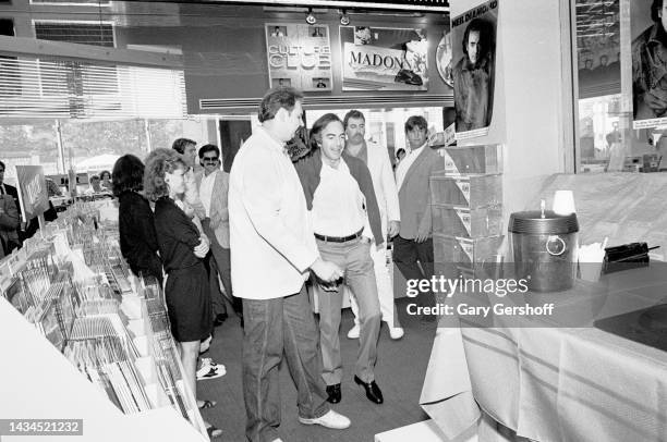 View of American singer-songwriter Neil Diamond as he arrives for an in-store at Tower Records, New York, New York, July 24, 1986. Diamond was there...