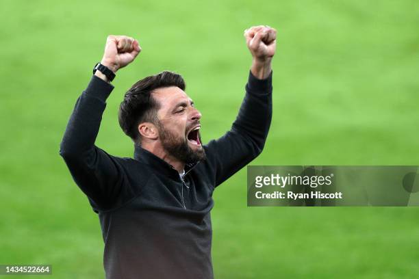 Russell Martin, Manager of Swansea City, celebrates their side's win after the final whistle of the Sky Bet Championship between Swansea City and...