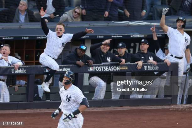 Aaron Judge of the New York Yankees rounds the bases after hitting a home run against the Cleveland Guardians during the second inning in game five...