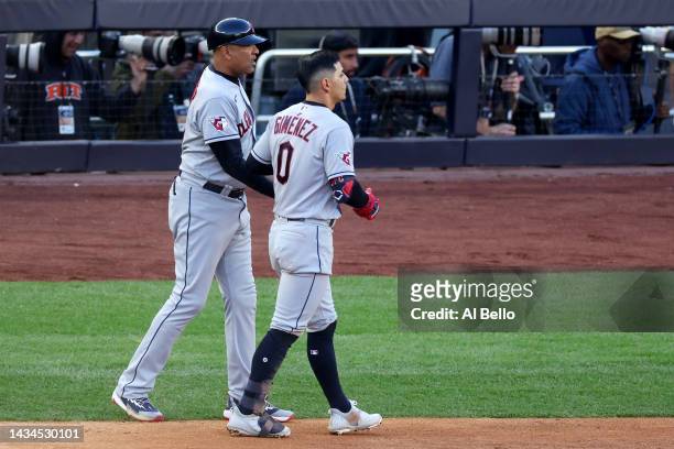 Andres Gimenez of the Cleveland Guardians walks off the field after getting out during the fourth inning against the New York Yankees in game five of...