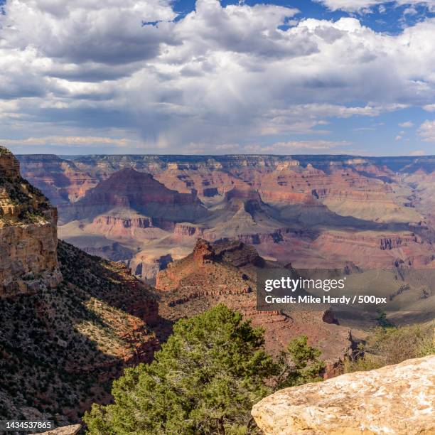 scenic view of landscape against cloudy sky,grand canyon village,arizona,united states,usa - grand canyon village stockfoto's en -beelden