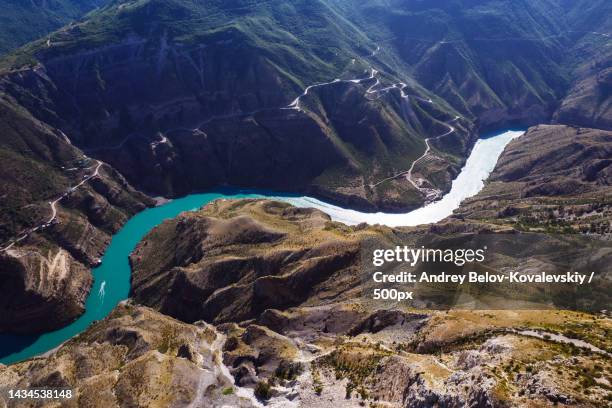 high angle view of river amidst mountains,russia - russia travel stock pictures, royalty-free photos & images