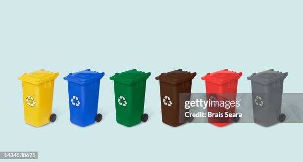 colorful plastic bins for different waste types - garbage can stock pictures, royalty-free photos & images