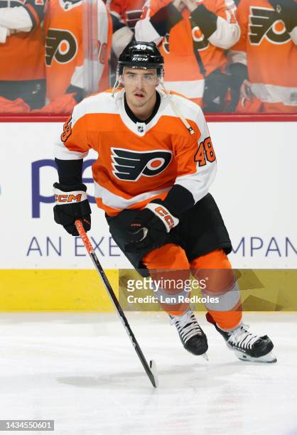 Morgan Frost of the Philadelphia Flyers skates during warm-ups against the New Jersey Devils at the Wells Fargo Center on October 13, 2022 in...